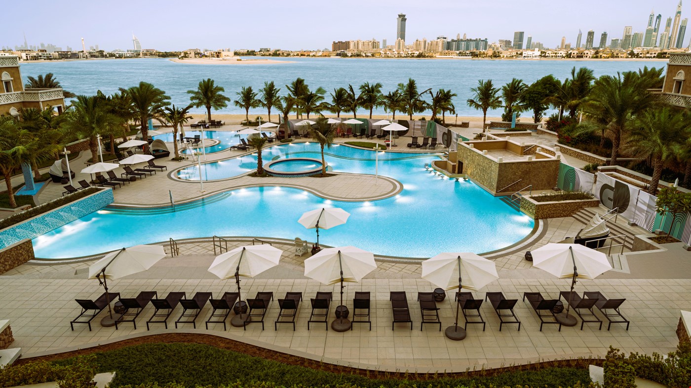 Hotel Dubai United Arab Emirates nomad remote 4d1853b2-94ee-405f-93f3-e8381f27bbdb_LargeOutdoorPoola.jpg