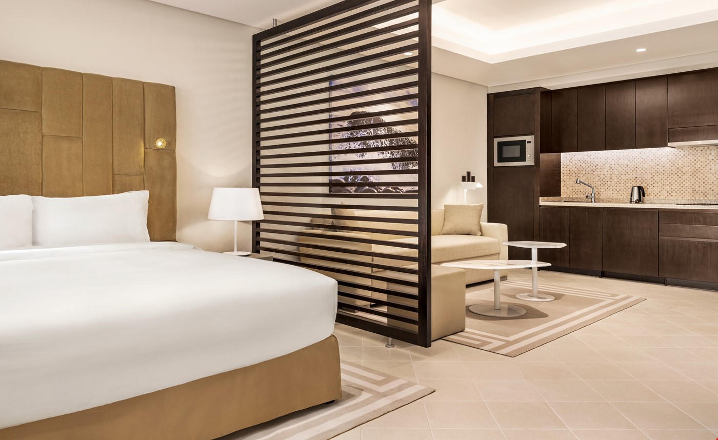 Hotel Dubai United Arab Emirates nomad remote 9aebf2a0-5420-423c-94ec-9c58b4d6f611_WyndhamResidencesThePalmStudioRoomGardenView1520361a.jpg