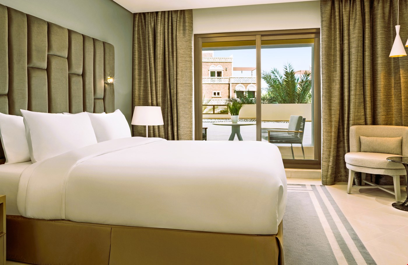 Hotel Dubai United Arab Emirates nomad remote abb8bcd9-f1dc-4bf9-ae80-edc3ffd75336_OneBedroomApartmentMasterBedrooma.jpg